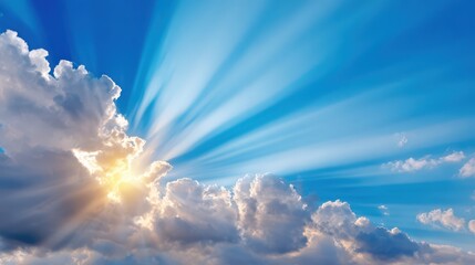 Sun Rays Shining Through Clouds in a Blue Sky, Representing Hope, Faith and Spirituality