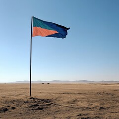 A flag, simple design of navy, teal, and coral colors, billows in a vast desert landscape under a clear sky