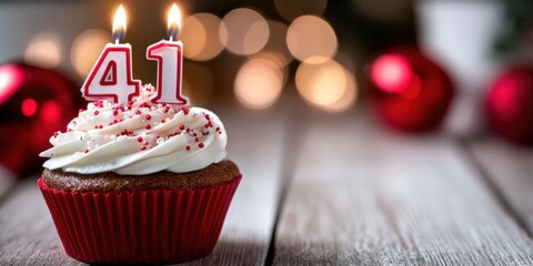 Obraz na płótnie Canvas Festive Cupcake With Number 41 Candles, Celebrating Milestone Birthday and Anniversary