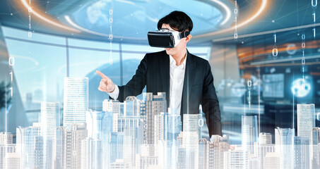 Business man wearing augmented reality glasses while looking at building simulated with glowing color. Project manager planning for investment while inspecting financial business city. Ingenuity.