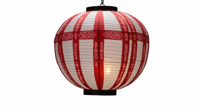 Traditional red and white paper lantern hanging with warm glow  