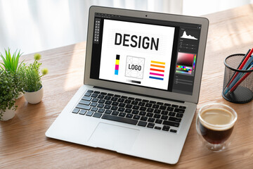 Graphic designer software for modern design of web page and commercial ads showing on the computer screen