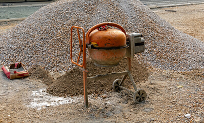 Petrol gravel mixer machine on a construction site outdoors