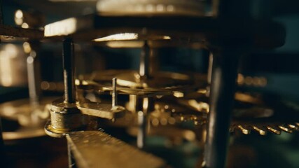 Spinning teeth interlocked gears located inside time device closeup. Macro view - Powered by Adobe
