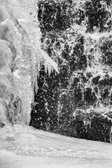 Water and ice at a small dam in central Connecticut.
