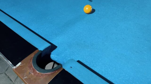 Man playing professional billiards in a focused competitive setting
