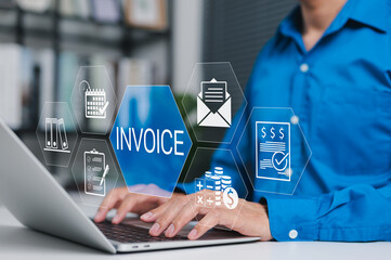 E-Invoice and Online Billing Management Concept. A person working on laptop with digital invoice...
