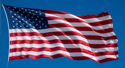 Fototapeta premium A vibrant United States flag boldly waves against a clear, brilliant blue sky, symbolizing patriotism, freedom, and national pride. Perfect for Fourth of July, Memorial Day, election themes, and