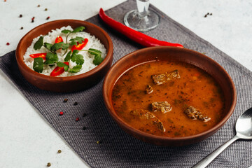 Georgian cuisine dish in a restaurant on a light background