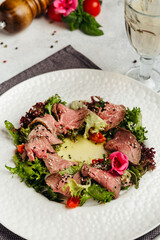 Georgian cuisine dish in a restaurant on a light background