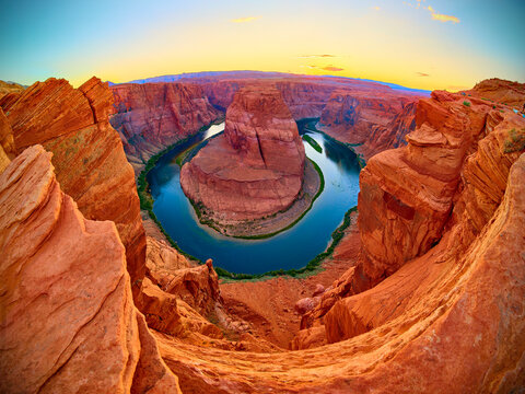 Horseshoe Bend Colorado River Canyon at Sunset Aerial Fly Through - Powered by Adobe