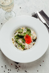 Georgian cuisine dish in a restaurant on a light background