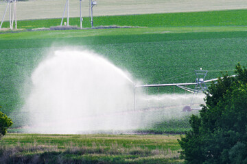 Irrigation system of agricultural fields. Linear irrigation systems. Aerial view