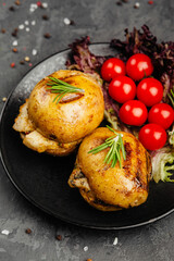 juicy golden grilled barbecue meat with spices on dark background