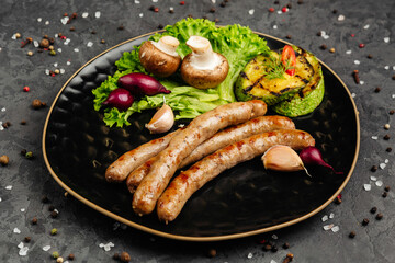 juicy golden grilled barbecue meat with spices on dark background