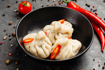 juicy golden grilled barbecue meat with spices on dark background