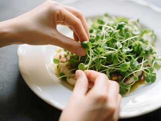 Gourmet Dish Being Garnished with Microgreens
