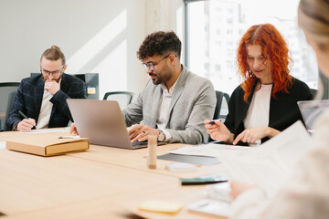 Business people working together in modern office meeting room