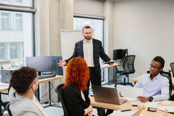 Team collaborating in modern office setting