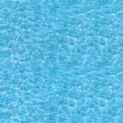 Water ripple seamless background texture - top view of clean, clear, blue water ripples. Image can...
