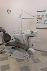 Dental Clinic Examination Room with Chair and Equipment