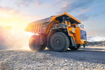 Amazing industry photo, Coal mine excavation with heavy dump truck under sunset sky