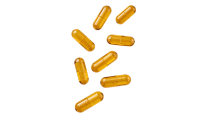 Falling yellow pills isolated on transparent background png