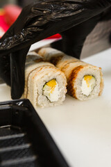 delivery of Japanese steel rolls made of rice and fresh fish