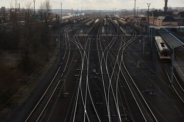 Railway tracks at a station reflecting light