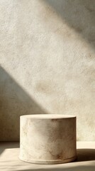 Soft limestone podium set against a calm greige background for product displays or artistic presentations