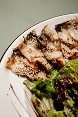 a dish in a restaurant on an olive background