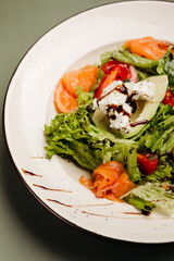 a dish in a restaurant on an olive background
