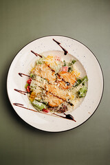 a dish in a restaurant on an olive background