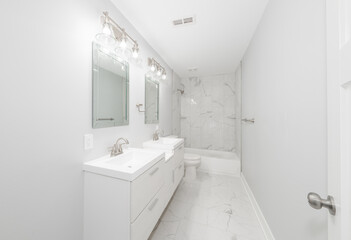 bathroom has been updated with a new vanity new tile and new fixtures installed by a professional