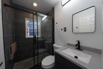 bathroom has been updated with a new vanity new tile and new fixtures installed by a professional