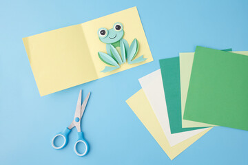 Flat color paper frog created using quilling method, top view. Great for stationery brands,...
