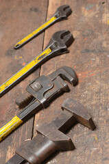 Vintage Wrenches and Tools on Rustic Workbench Showcasing Craftsmanship