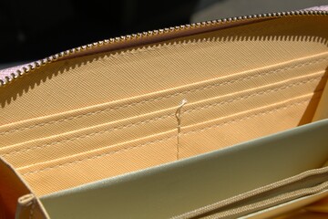 leather pink wallet with beige interior