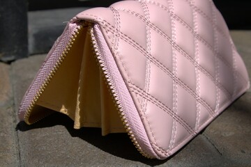 leather pink wallet with beige interior