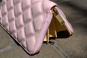 leather pink wallet with beige interior