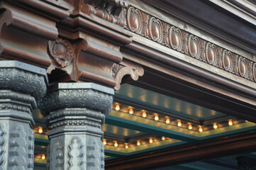 Ornate columns and ceiling lights at historic architectural site