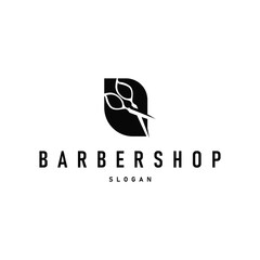 barbershop logo design concept of a barber shop with a vintage retro concept of scissors and razors also a cool and minimalist barbershop tube icon illustration of a symbol template