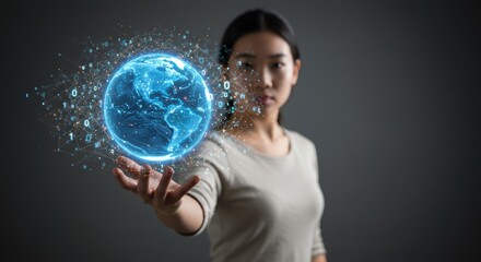 Asian woman displaying a glowing digital globe with network connections on hand