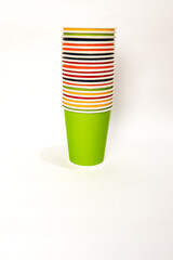 Stack of Colorful Paper Cups on White Background: Party Supplies and Essentials