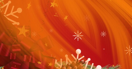 Fototapeta premium Green pine branch and ribbon bow glowing in orange-red gradient, with pinecones, stars, snowflakes