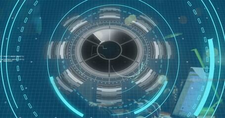 Displaying holographic interface projecting data rings over wooden desk, with laptop, mug and plant