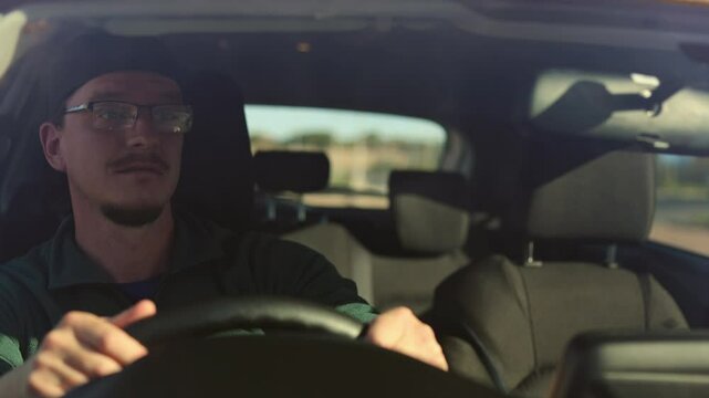 Young Man Driving Car and Arguing in Parking Lot