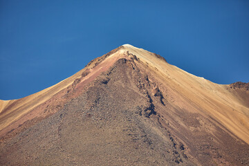The eastern slopes of Volcán Pichu Pichu catch the first light of day—rugged, remote, and rich with history. A sacred peak in the Andes, still standing guard over Arequipa’s highlands.