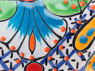Colorful Talavera pottery detailing showcasing traditional designs from Mexico
