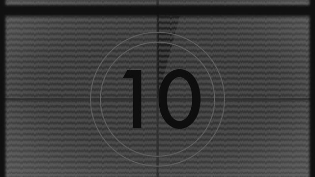 Displaying countdown on screen showing static noise, rotating text fragment, counting numerals